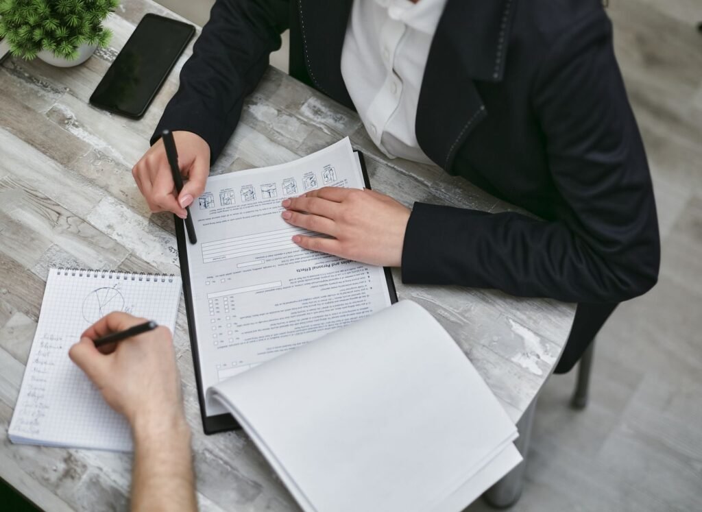 Corporate compliance checklist and company records being reviewed in Pakistan