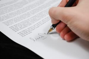 Signing a power of attorney document in Pakistan